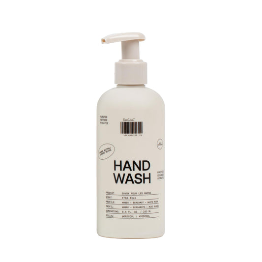 DedCool Xtra Milk Hand Wash bottle on a counter, showing a hydrating formula for daily care.