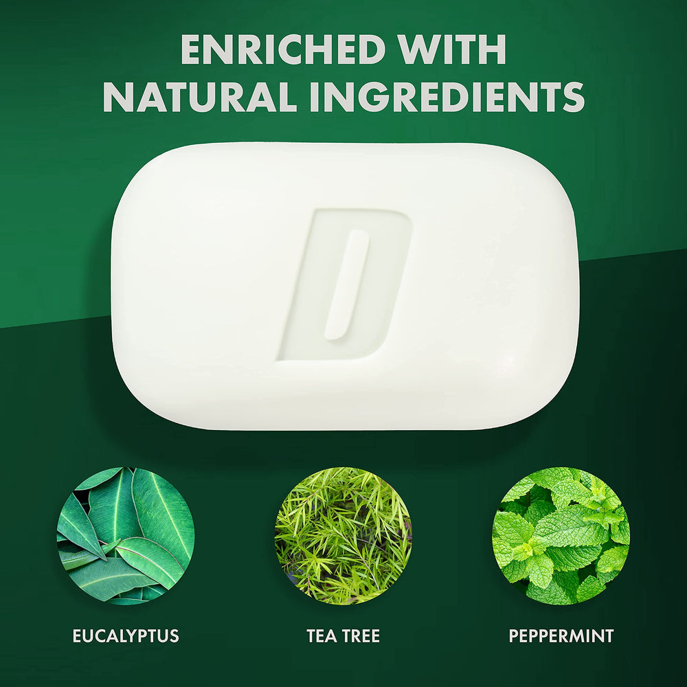 Defense Soap tea tree oil drops on the bar surface suggesting cleansing power