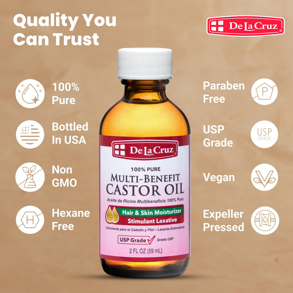 Pouring De La Cruz Castor Oil for scalp hydration.