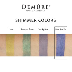 DEMÚRE Blue Sparkle swatch on arm shows pigment and smooth glide.