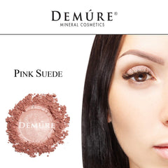 Demure Eye Shadow application brush aids smooth layering and precise color.