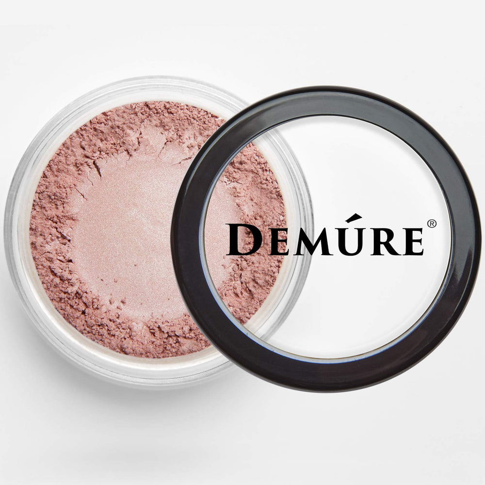 Demure Pink Passion swatches on skin displaying buildable color and glow