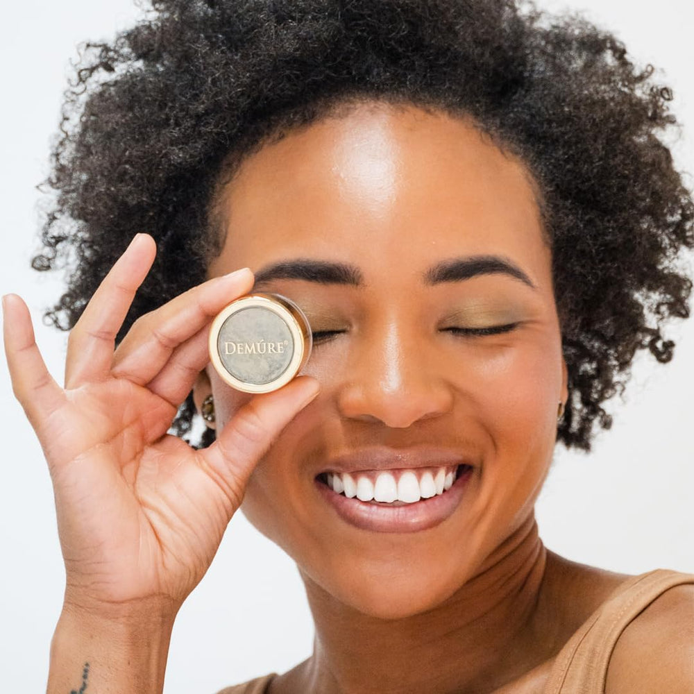 Demure Moss shade swatch shows rich pigment and buildable color.