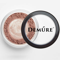 Demure mineral pigments close-up reveals natural color payoff from crushed earth minerals.