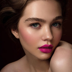 Depuplum DM10 red lipstick swatch with strong color