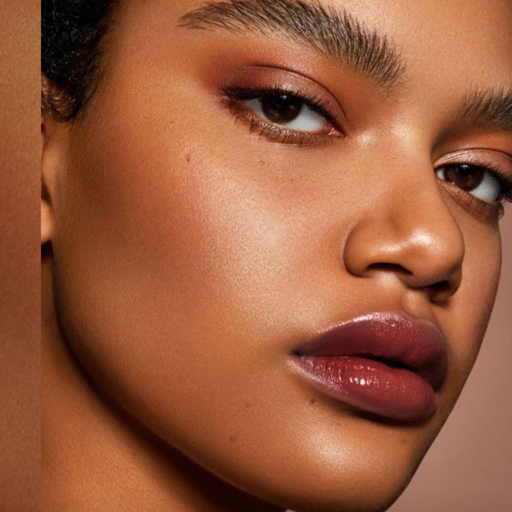 Depuplum Hydrate Lipstick with shea butter and coconut oil nourishes lips.