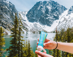 Dermatone Sport Sunscreen Lotion with ski gear ready for winter sun