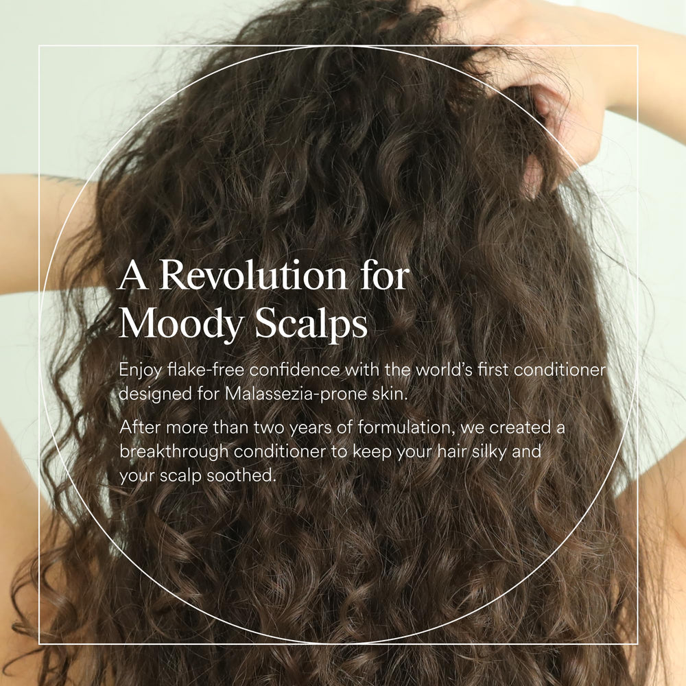 Dermazen Nourishing Conditioner creamy texture swatch suggesting silky, frizz-free shine.