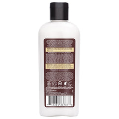 Desert Essence Coconut Soft Curls Hair Cream adds shine and definition during styling.