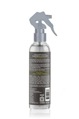 Hands applying Design Essentials Twist and Set Lotion for smooth twist.
