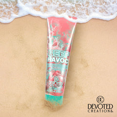 Devoted Creations Reef Havoc on sunlit beach suggests radiant bronzing