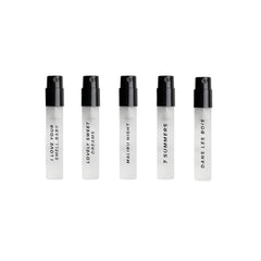 DIME Beauty perfume sampler travel case open showing vials for on the go