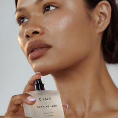 DIME Running Late perfume on skin conveys lively, confident aura