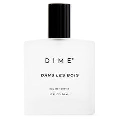 DIME Woodland bottle front, premium packaging for everyday feminine fragrance.