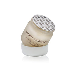 Dinur Cosmetics Micro Complex Deep Scrub texture close-up reveals fine Dead Sea sand polishing skin.