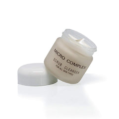 Dinur Cosmetics Micro Complex Deep Scrub dispensing close-up shows even application.