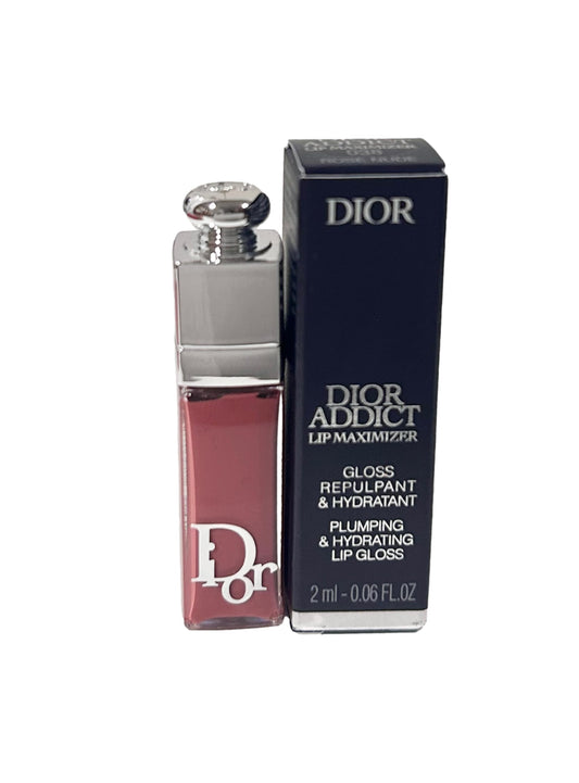 Dior Addict Lip Maximizer Rose Nude mini applying for a glossy look