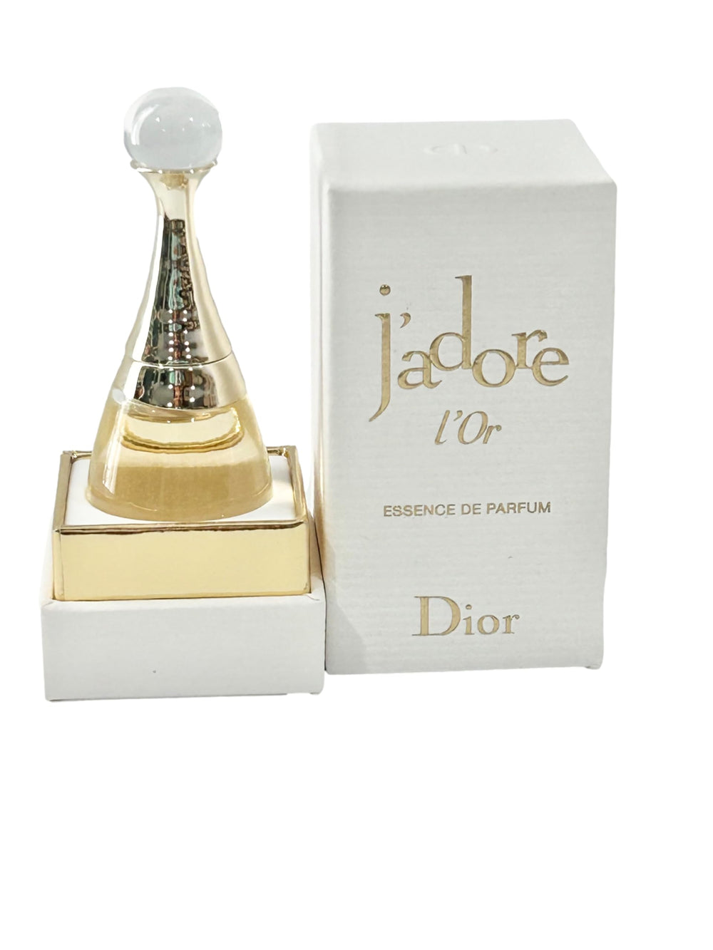 Dior J'adore Essence L'Or mini bottle cap closeup for on-the-go touch-ups