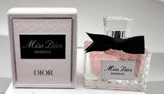 Dior Miss Parfum travel-size bottle, elegant design, ideal for on-the-go fragrance touch-ups.
