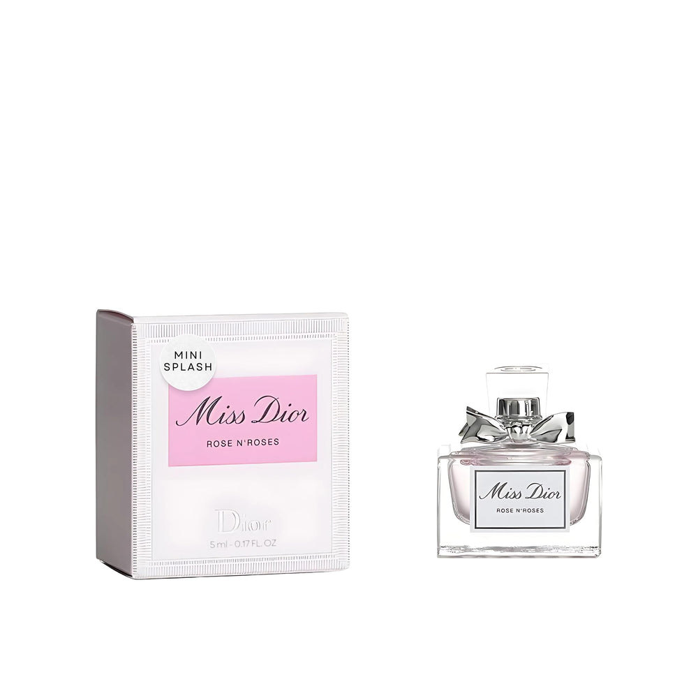 Miss Dior Rose N' Roses bottle with silver ribbon, elegant packaging for a luxe gifting moment