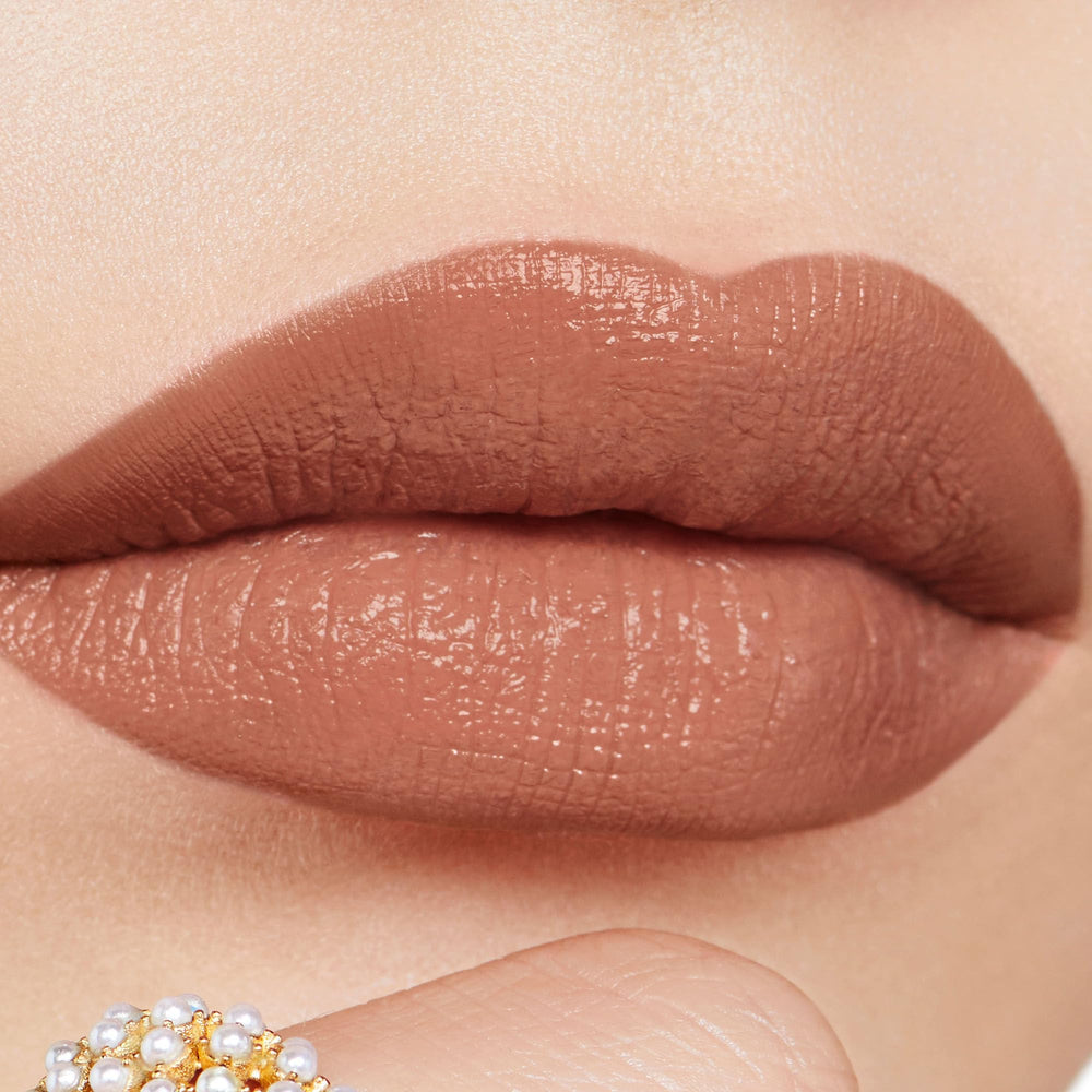 Floral lip care ingredients moisturize lips while delivering bold color payoff.