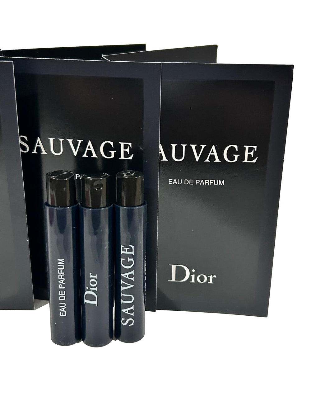 Dior Sauvage 1ml vial set arranged for quick scent testing.