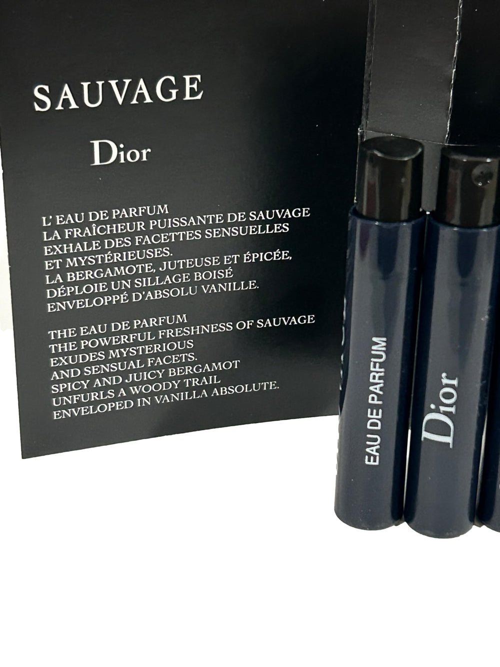 Three-piece Dior Sauvage sampler kit laid out for on-the-go sampling.