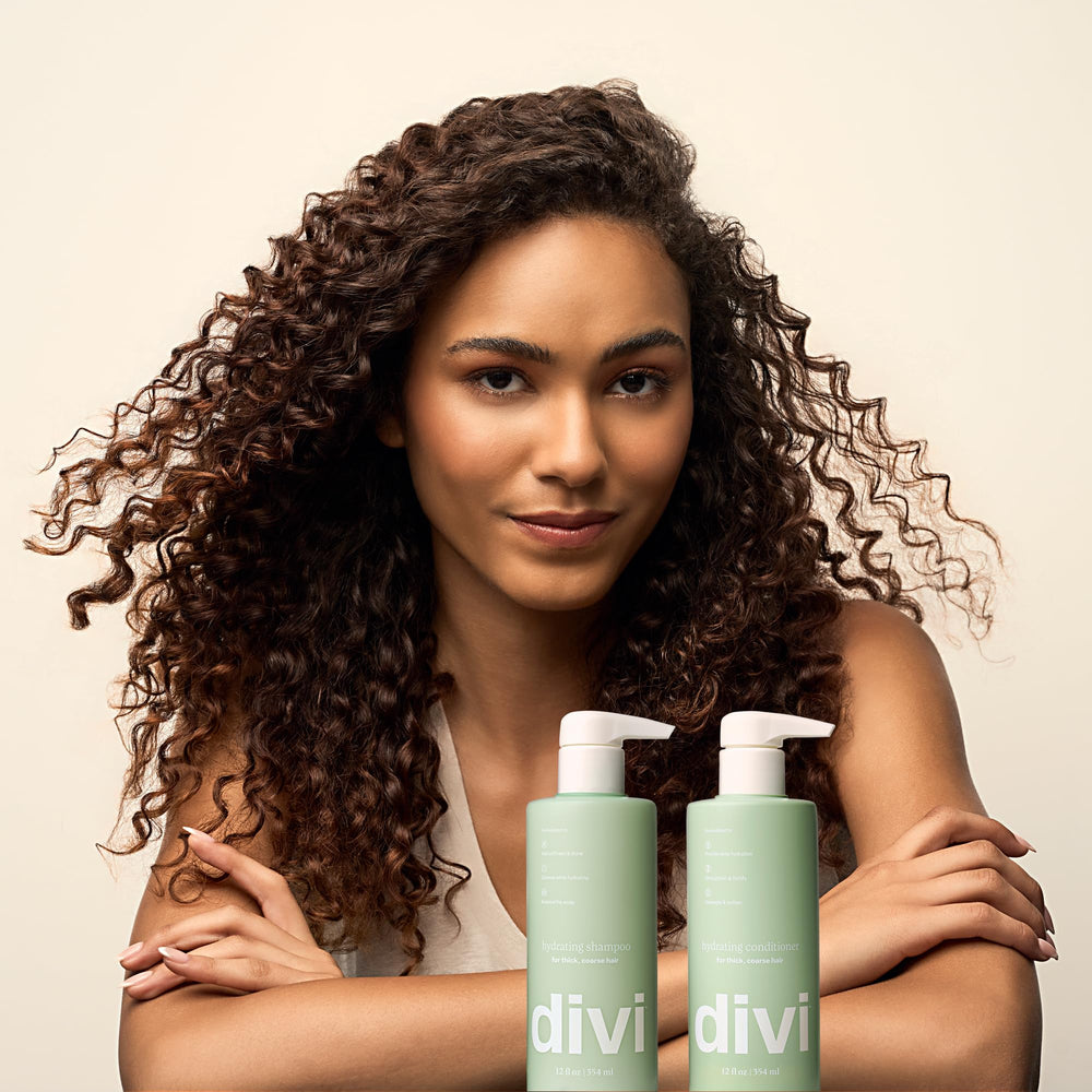 Divi brand logo on label indicating vegan cruelty-free hair care.