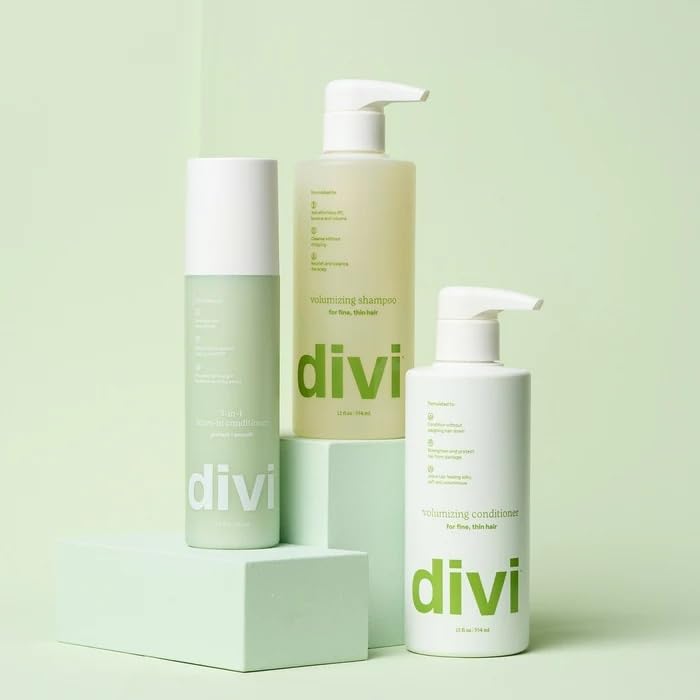 Divi Leave-In conditioner spray application showing even distribution on lengths.