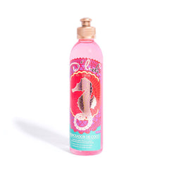 D'Luchi tanning oil bottle with coconut oil for a smooth, natural tan.