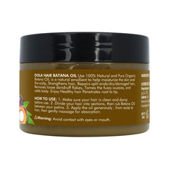 Dolahair Batana Oil bottle shown with warm, natural care quality