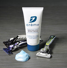 Dorco D Crème mentholated shaving cream tube application showing lotion-like glide for sensitive skin.