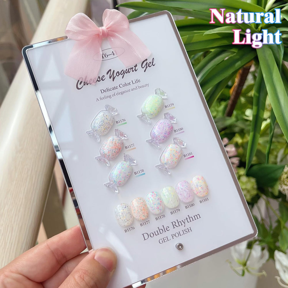 Eggshell green and purple shade swatches from the set