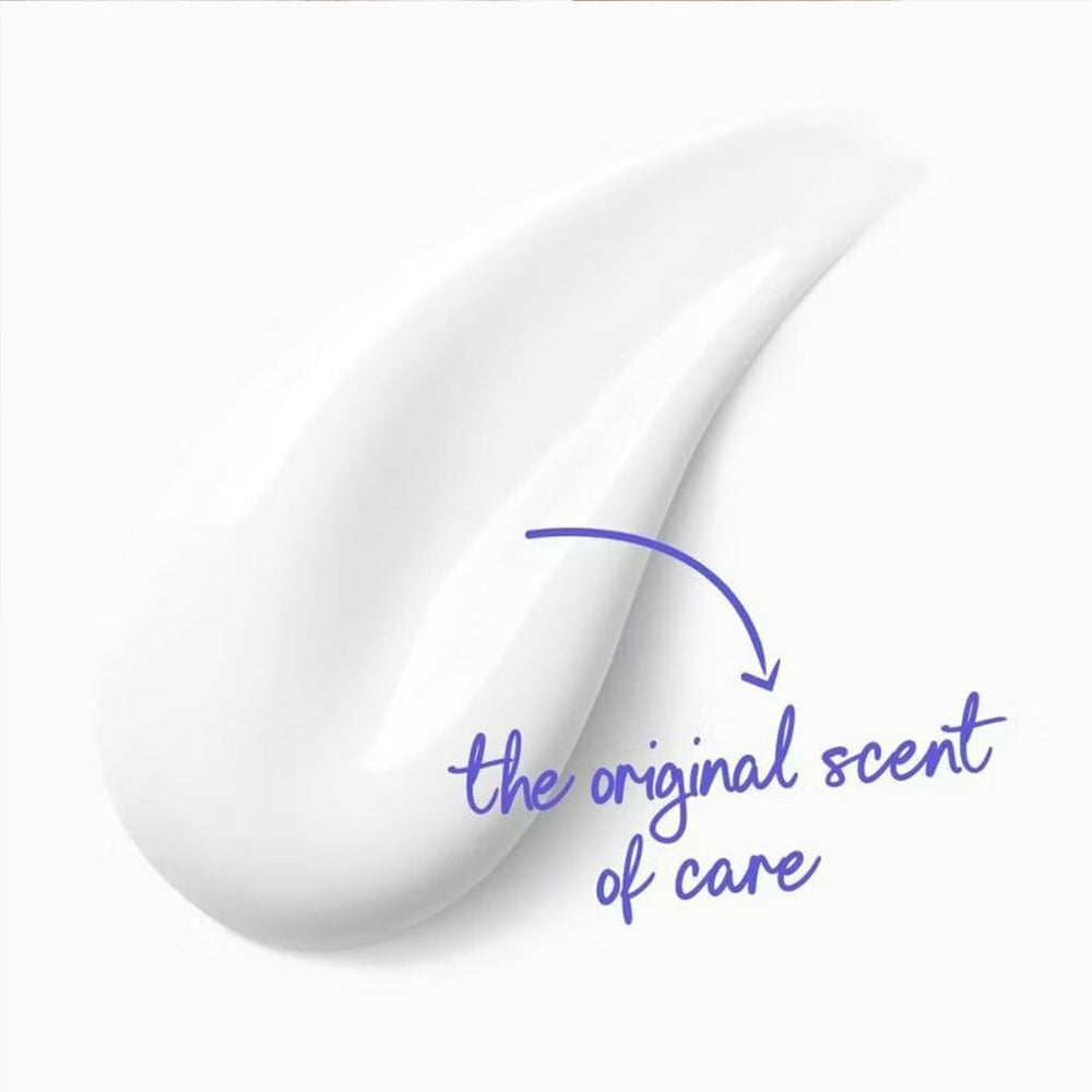 Dove Deep Moisture pH-balanced symbol on bottle for skin-friendly cleansing.