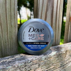 Close-up of packaging for Dove Men+Care Ultra Hydra Cream Lotion showing cruelty-free branding.