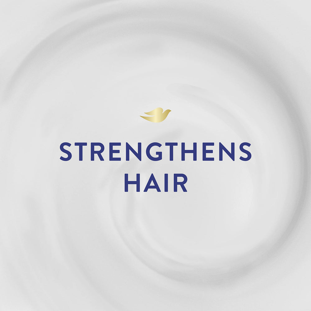 Dove Hair Mask being applied to mid-lengths for nourishment.
