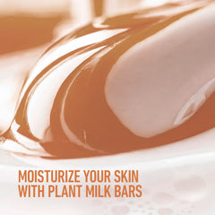 Dove Plant Milk Cleansing Bar milky-lather close-up highlights gentle cleansing.