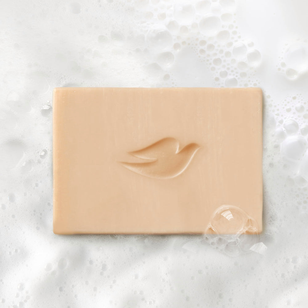 Dove Plant Milk Cleansing Bar demonstrates sulfate-free formula for sensitive skin.