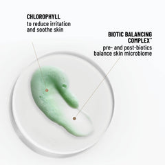 Dr. Brandt Clean Biotic bottle being squeezed to form a light lather for makeup removal