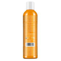 Close-up of Dr. Bronner's organic hair rinse label with USDA Organic and vegan badges