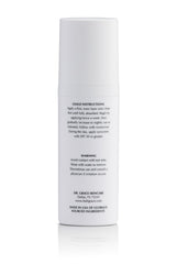 Dr. Grace Ultimate Retinol Serum dispenser demonstrates easy application.