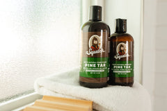 Dr. Squatch Pine Tar Shampoo packaging showcases rugged branding for men.