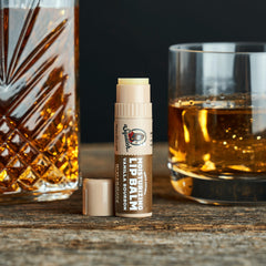 Dr. Squatch Vanilla Bourbon lip balm moisturizes lips with subtle vanilla notes.