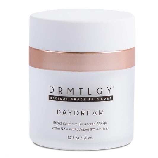 DRMTLGY Day Dream sunscreen bottle closeup showing SPF 40 protection and sleek packaging