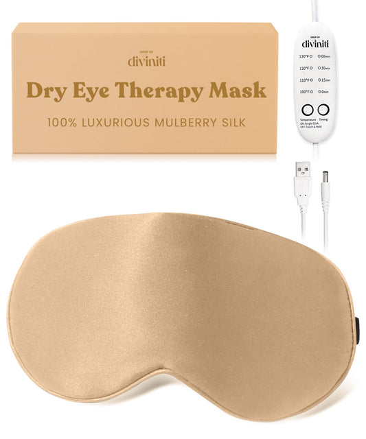 Drop of Diviniti heated eye mask front view, soft silk exterior for gentle eye comfort.