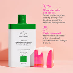 Luxurious creamy lather envelops hair, demonstrating moisture without residue.