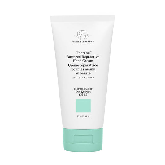 Drunk Elephant Therabu Hand Cream jar showing rich, nourishing texture for dry hands.