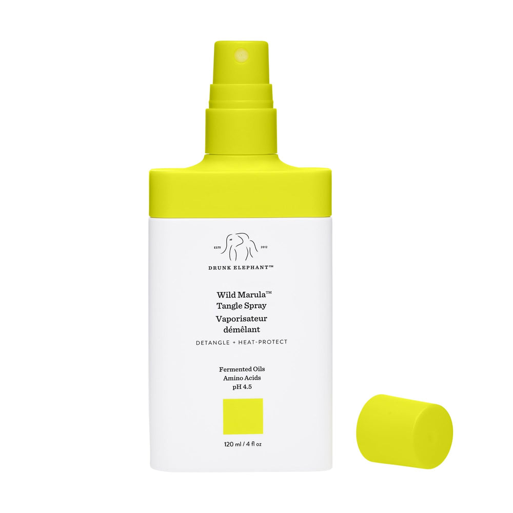 Drunk Elephant Wild Marula Tangle Spray mist dispensing evenly for easy combing