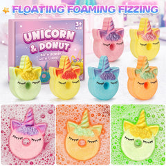 Duchong unicorn donut bath bomb fizzing close-up with colorful bubbles in tub