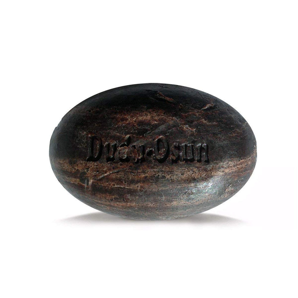 DuDu Dudu Osun soap lather blooming for daily cleansing ritual.
